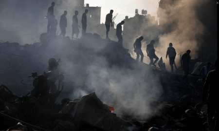 Search and rescue operation in the rubble of a collapsed building © UNRWA photo